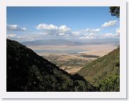 07IntoNgorongoro - 161 * From the crater's rim, looking at the Lerai forest and Lake Magadi. The Sopa lodge is on the other side of the crater.